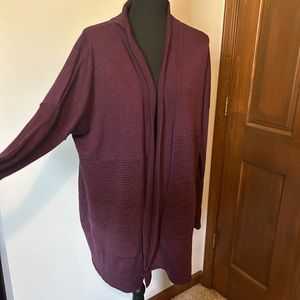 Lululemon size 10 plum cardigan sweater with split back and pockets!